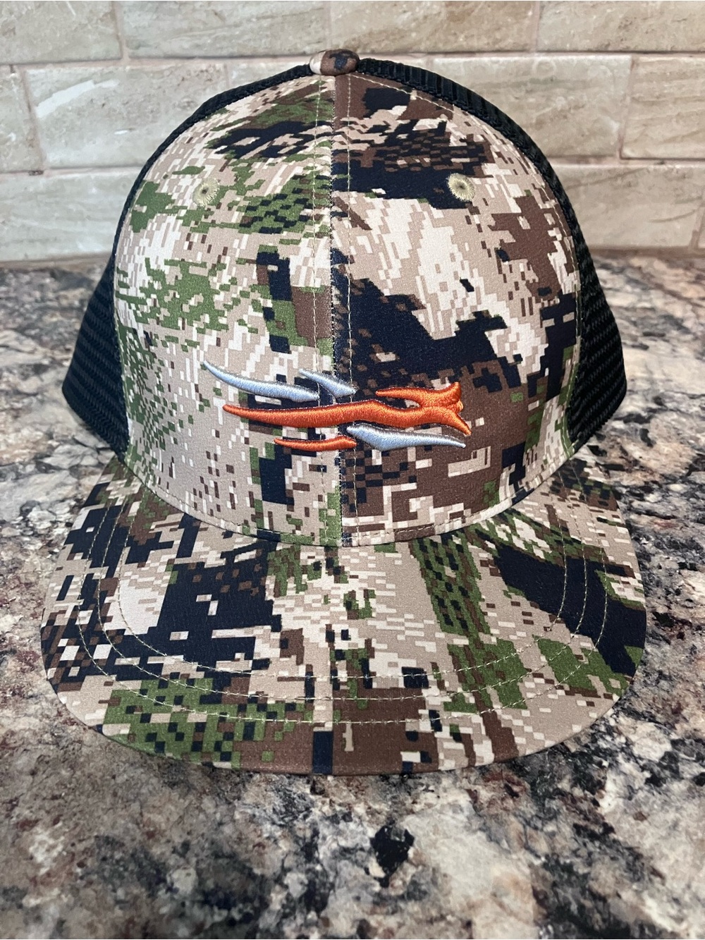 Black Mesh Trucker Hat with Orange Tag Detail